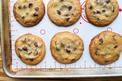 Chocolate chip cookies baked on a nonstick silicone baking mat