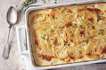 Overhead photo of a pan of baked scalloped potatoes.