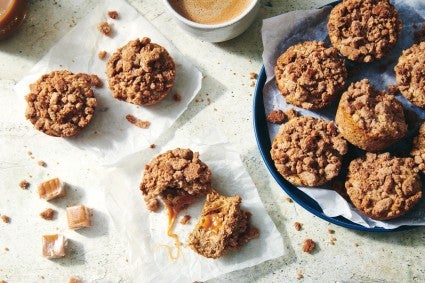 Overhead photo of cookies scattered on parchment paper.