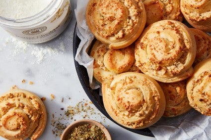 A platter of swirled, savory cheese and onion buns