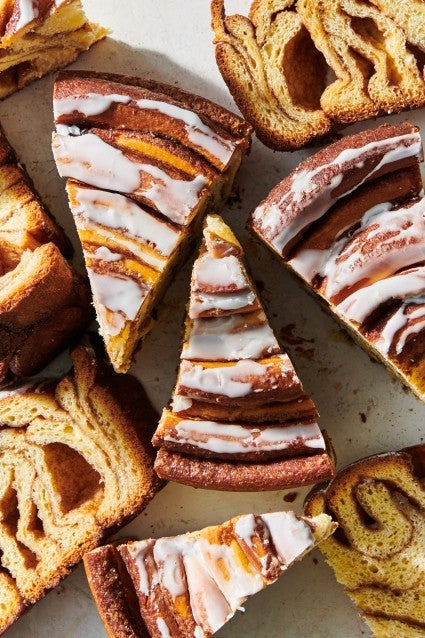 Slices and cross-sections of a large-format cinnamon roll