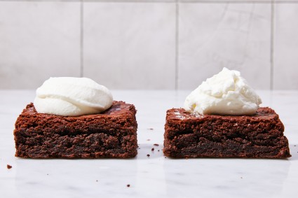 Perfectly whipped cream on a brownie next to over-whipped cream on a brownie