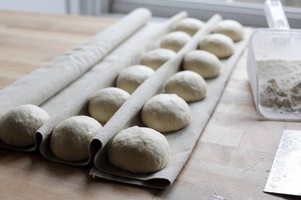 Dough rising on baker's linen