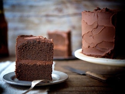 Piece of cake sitting on plate. 