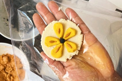 Unpressed tortilla with colorful flower design