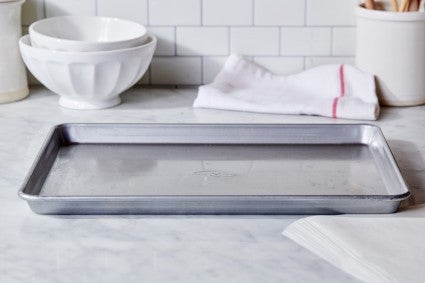 Half-sheet pan on baking work surface 