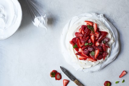 Pavlova topped with strawberries