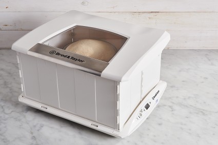 Folding bread proofer with bread dough inside