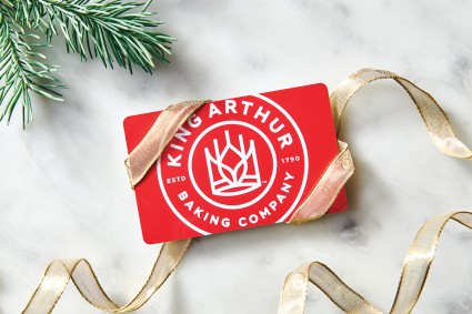 King Arthur gift card wrapped in gold ribbon