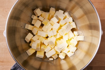 Cubes of cold butter in a stand mixer bowl