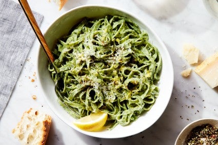Bowl of pasta with green sauce