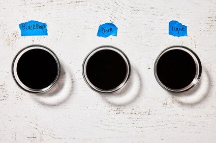 Small containers of different types of molasses