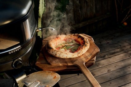 Neopoltain pizza on a pizza peel, straight from a gansney pizza oven