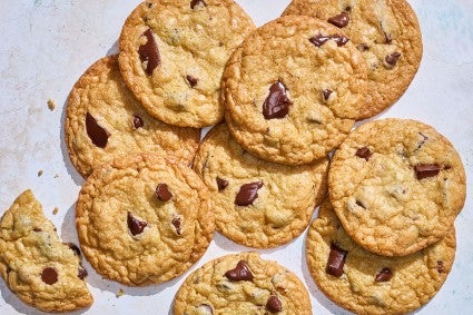 Cream Cheese Chocolate Chip Cookies arranged on a counter, seen from above.