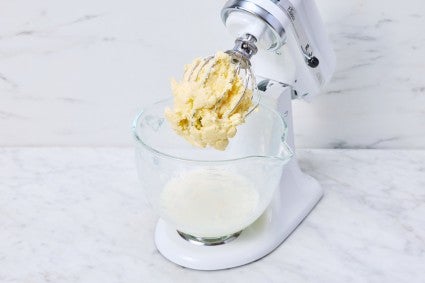cultured butter in a stand mixer with solids and liquids separated