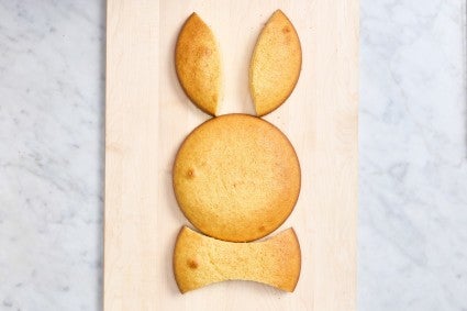 Yellow cake cut and assembled to resemble a bunny shape