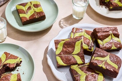 Mint Brownies stacked and arranged on plates.