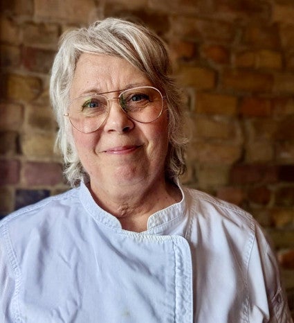 A headshot of Deborah Reid