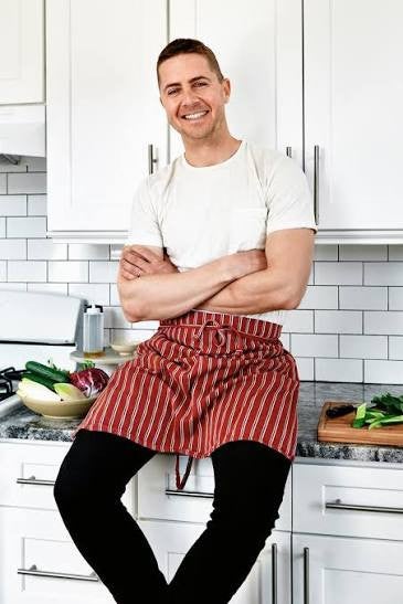 Lukas Volger sitting in a kitchen