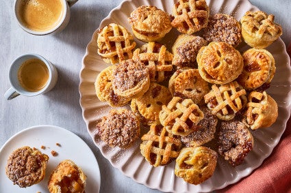 Lots of Mini Apple Pies arranged on a plate