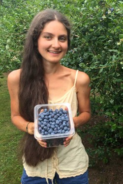 Tali holding blueberries