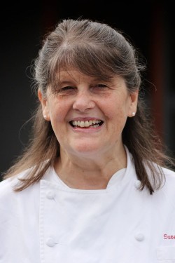A headshot of Susan Miller