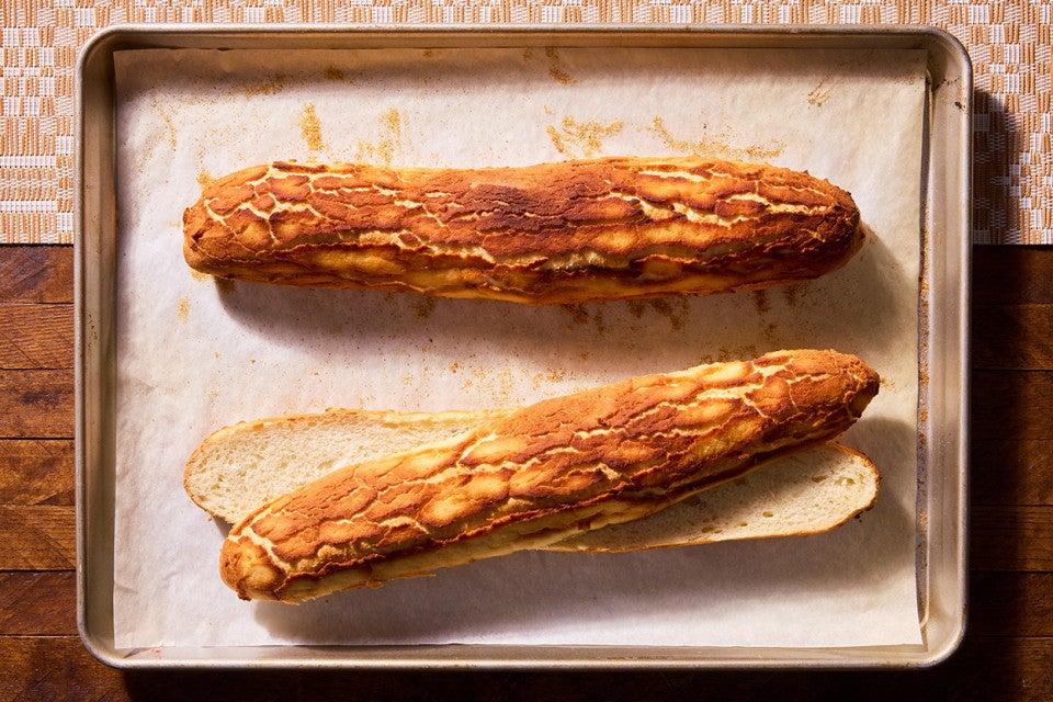 Dutch Crunch Rolls on a baking sheet