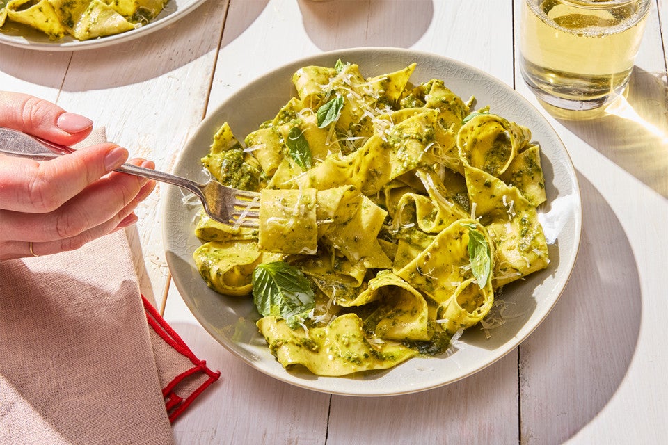 Fresh Pasta on a plate being twirled by a fork