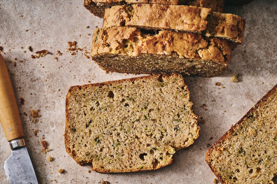 Almond Flour Zucchini Bread sliced on parchment