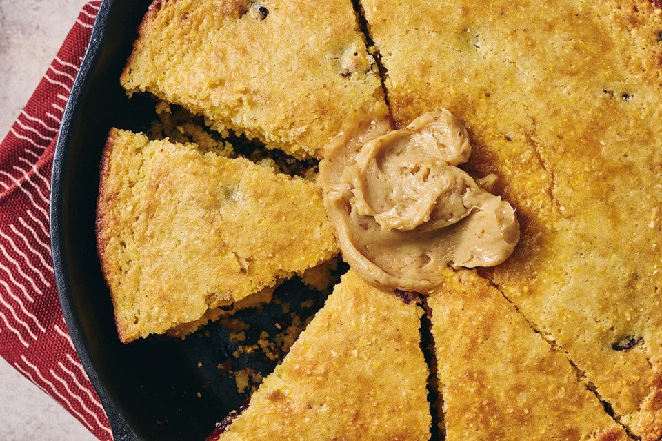 Cranberry Cornbread in a cast iron pan