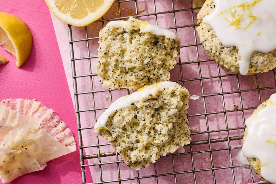 A broken open Lemon Poppy Seed Muffin