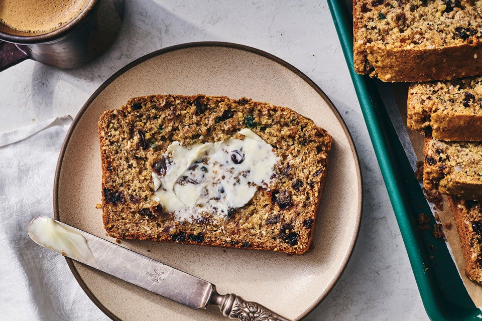 Rye Soda Bread on a plate with butter spread