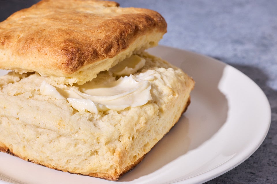 Small-Batch Biscuit served on a plate with butter