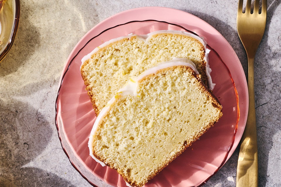 2 slices of Glazed Sourdough Lemon Cake on a plate