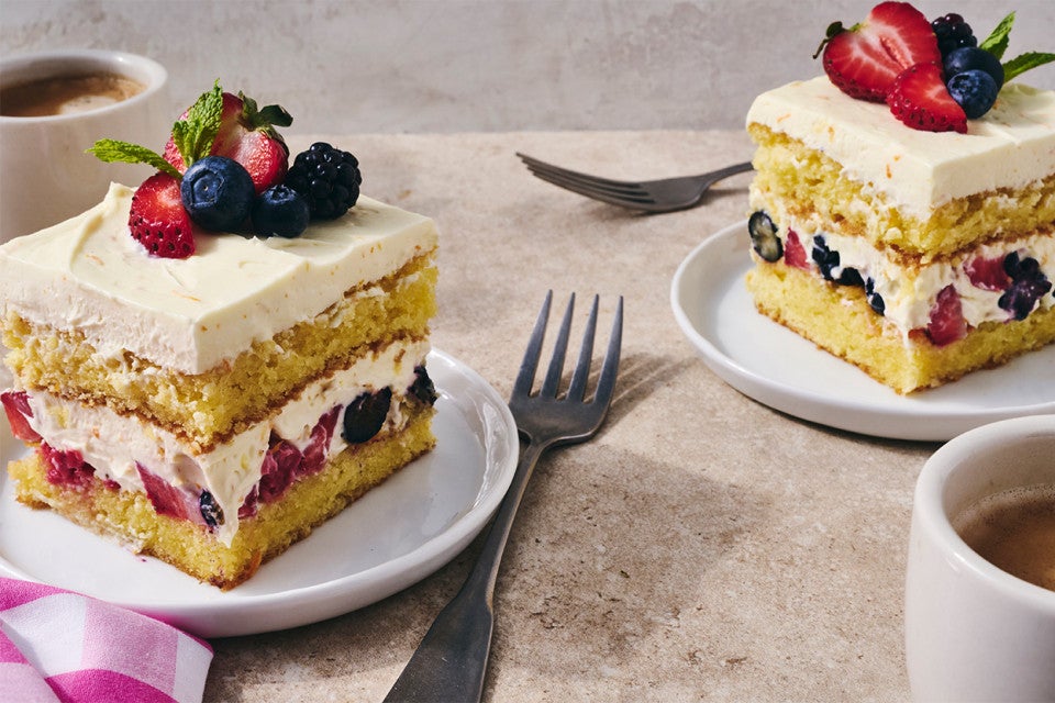 Two slices of Berry Tiramisu on plates