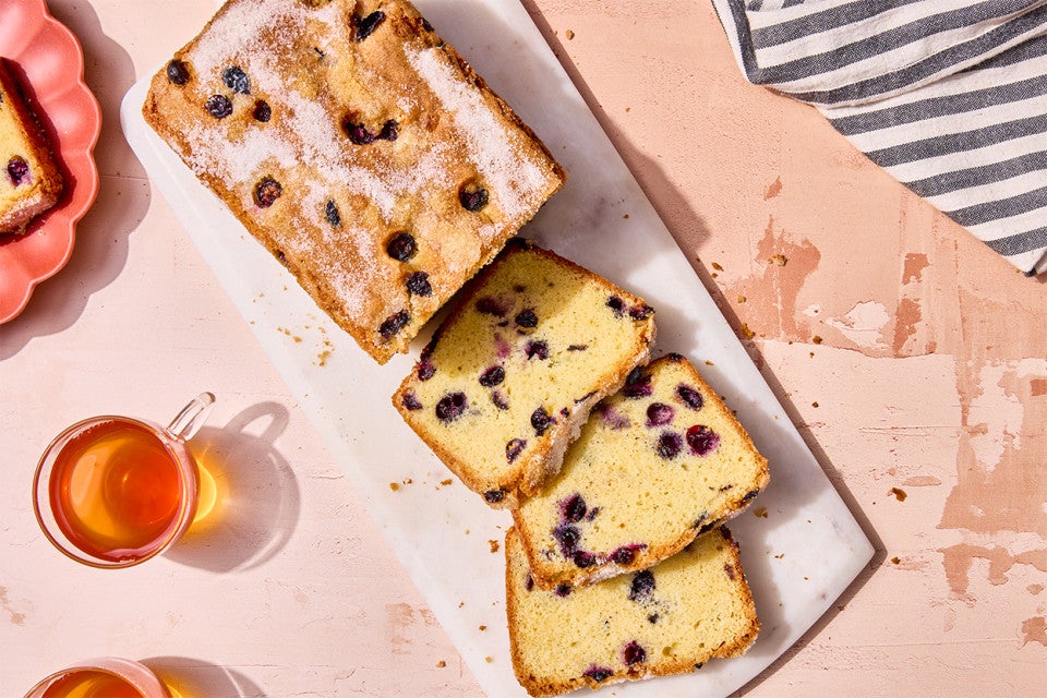 Blueberry Bread sliced on a cutting board