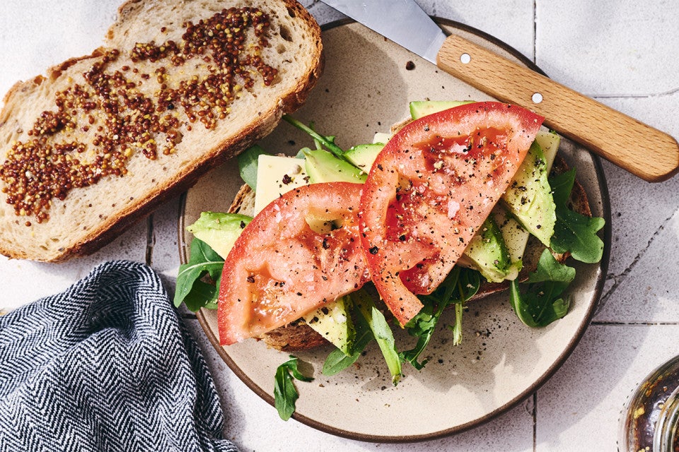 Preparing a sandwich on Caraway Rye Bread