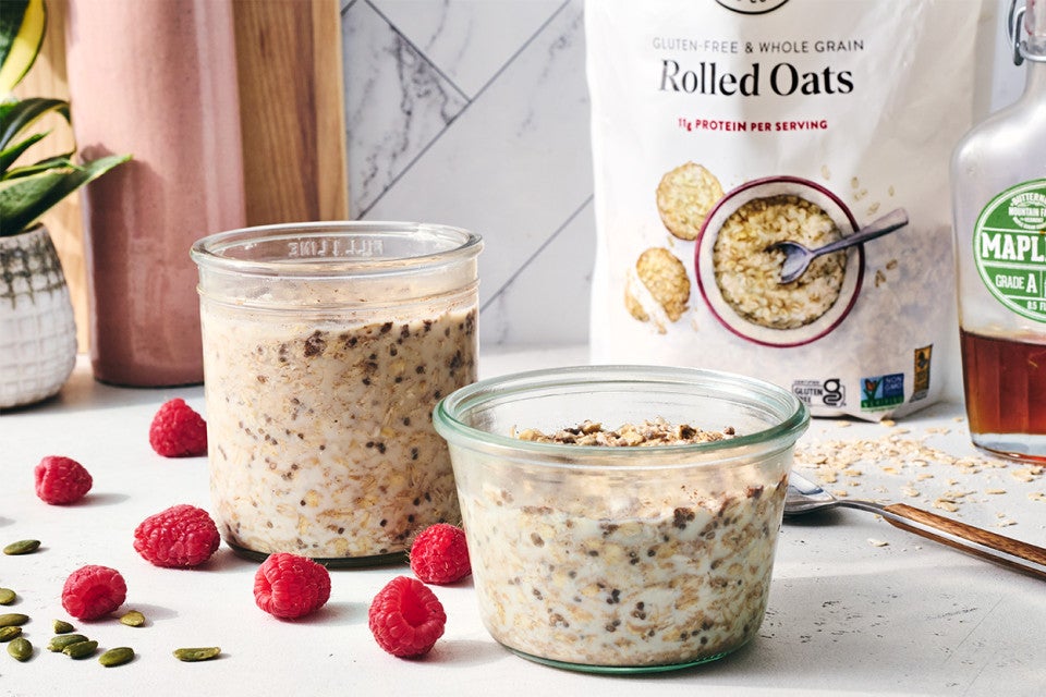 Simple Overnight Oats in jars with raspberries