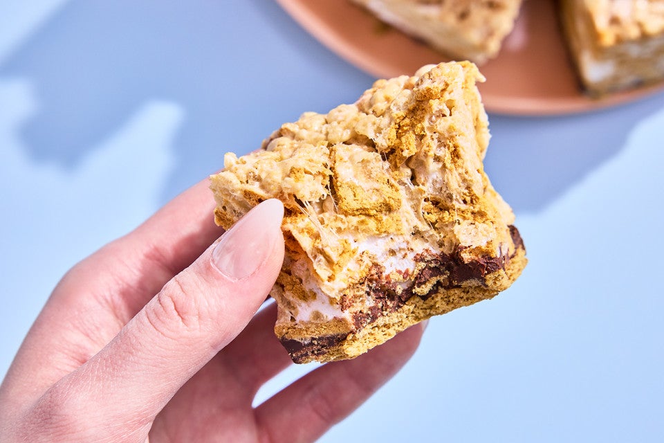 A hand holding a S’more Rice Krispies Treat