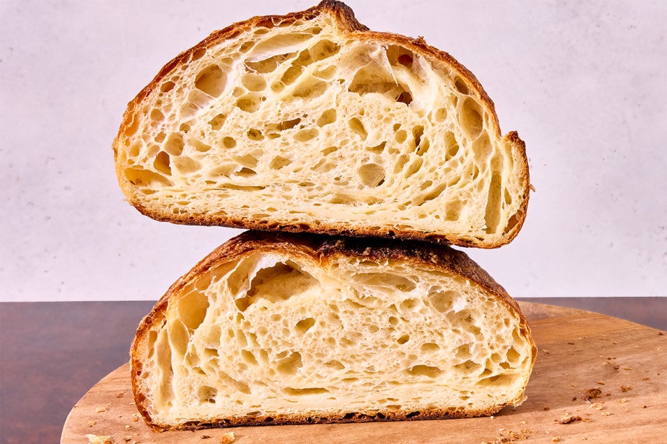 Croissant Sourdough Bread cut in half and stacked high
