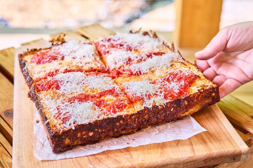 Pizza Oven Detroit Pizza on a cutting board