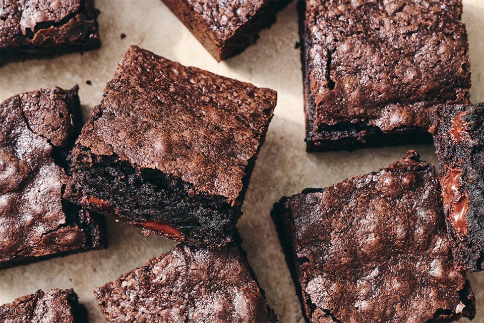 Deep-Dark Fudgy Brownies on parchment paper