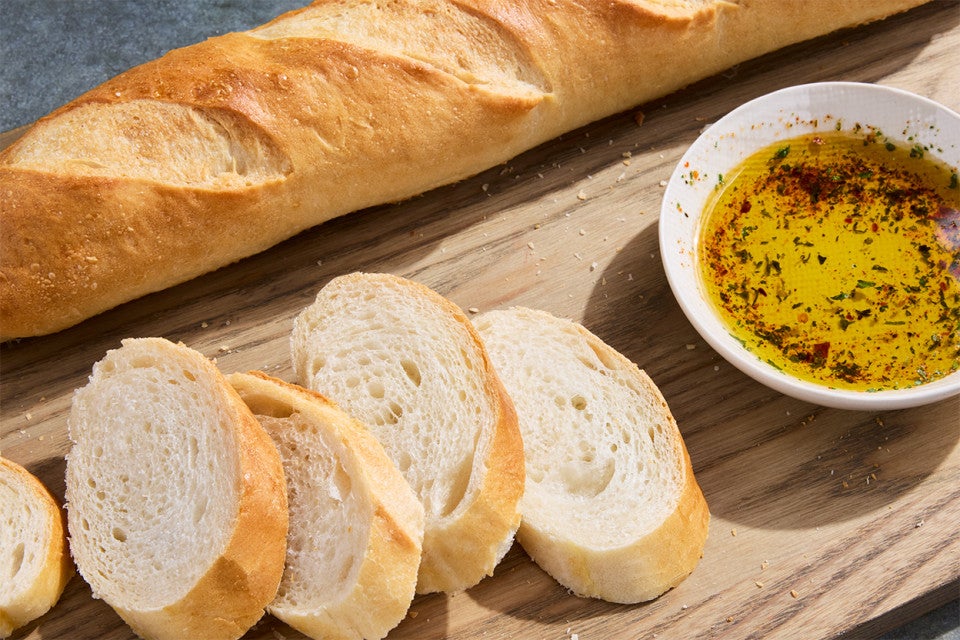 Food Processor French-Style Bread sliced up with dipping oil