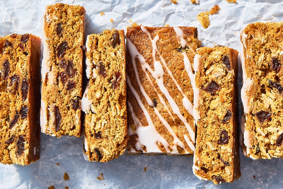 Oatmeal Raisin Cookie Bars sliced up on parchment paper