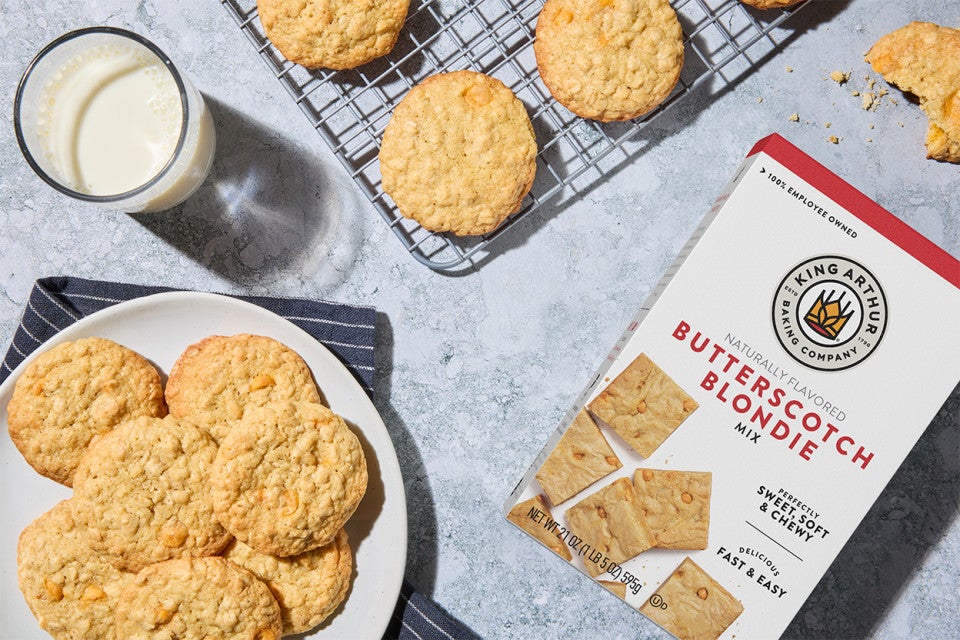 Butterscotch Blondie Oatmeal Scotchies on a plate and on a cooling rack
