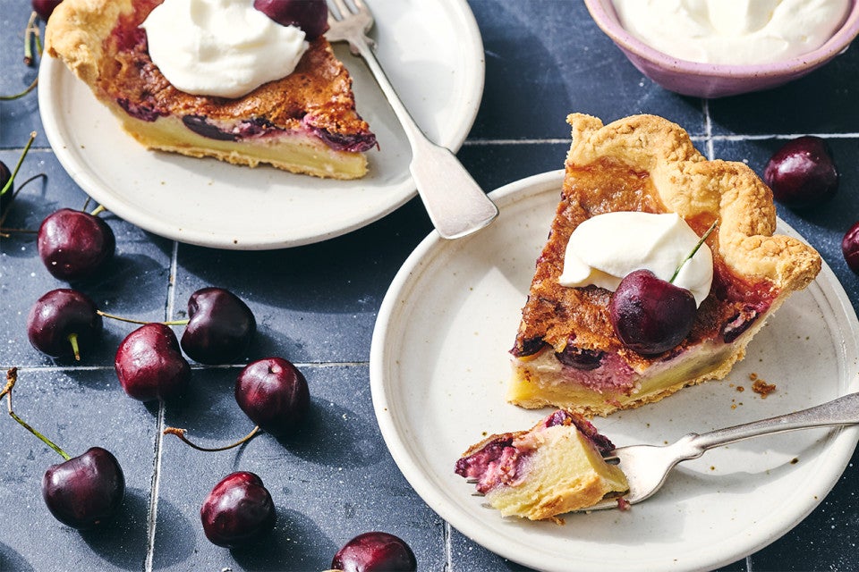 Cherry-Vanilla Cream Pie on plates with cherries