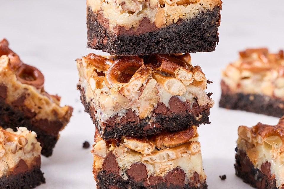 A stack of three gluten free seven chocolate layer bars.
