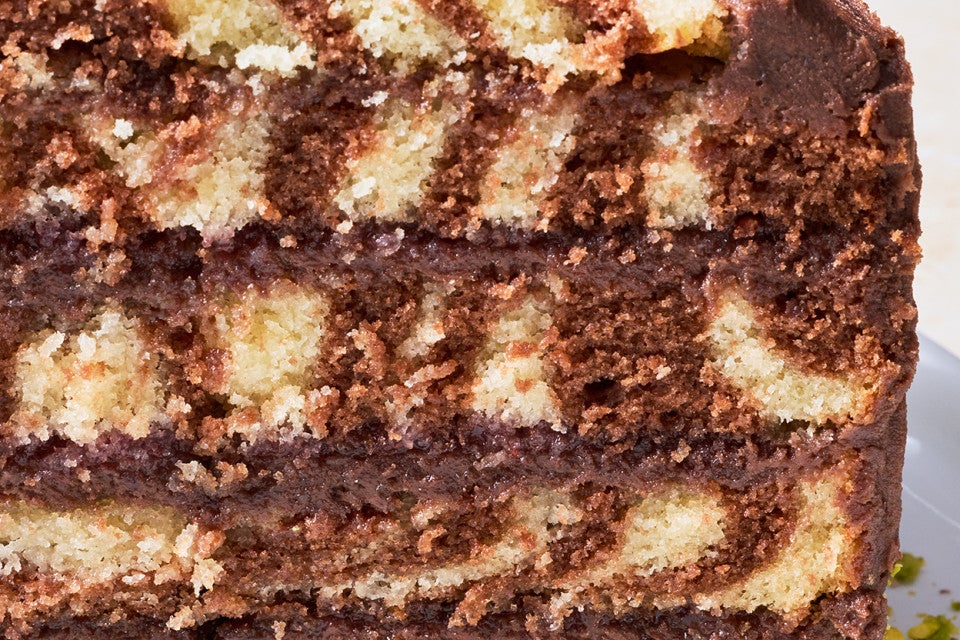 Side view of marbled cake layers of vanilla and chocolate baked to perfection.