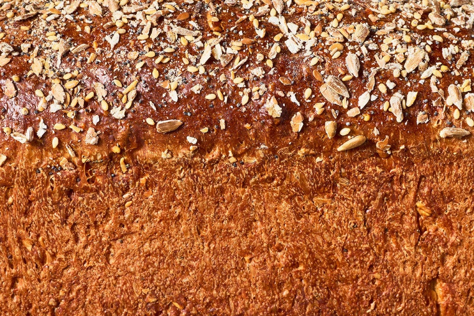 A side detail shot of a Multigrain Protein Bread loaf.