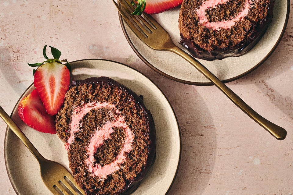 Chocolate Strawberry Roll Cake on plates